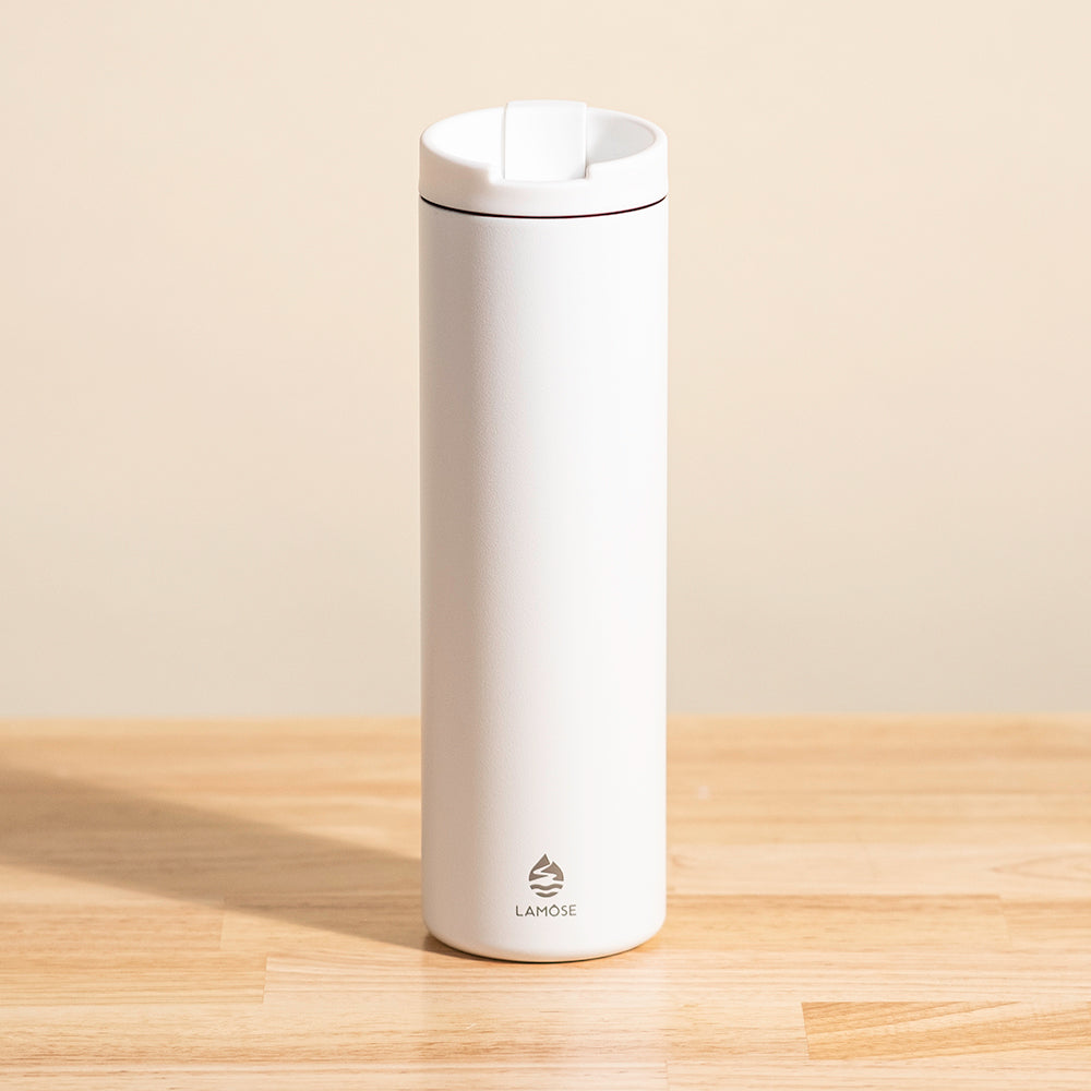 LAMOSE Grouse 20 oz insulated bottle in snow white, front view, featuring a flip-top lid and logo.