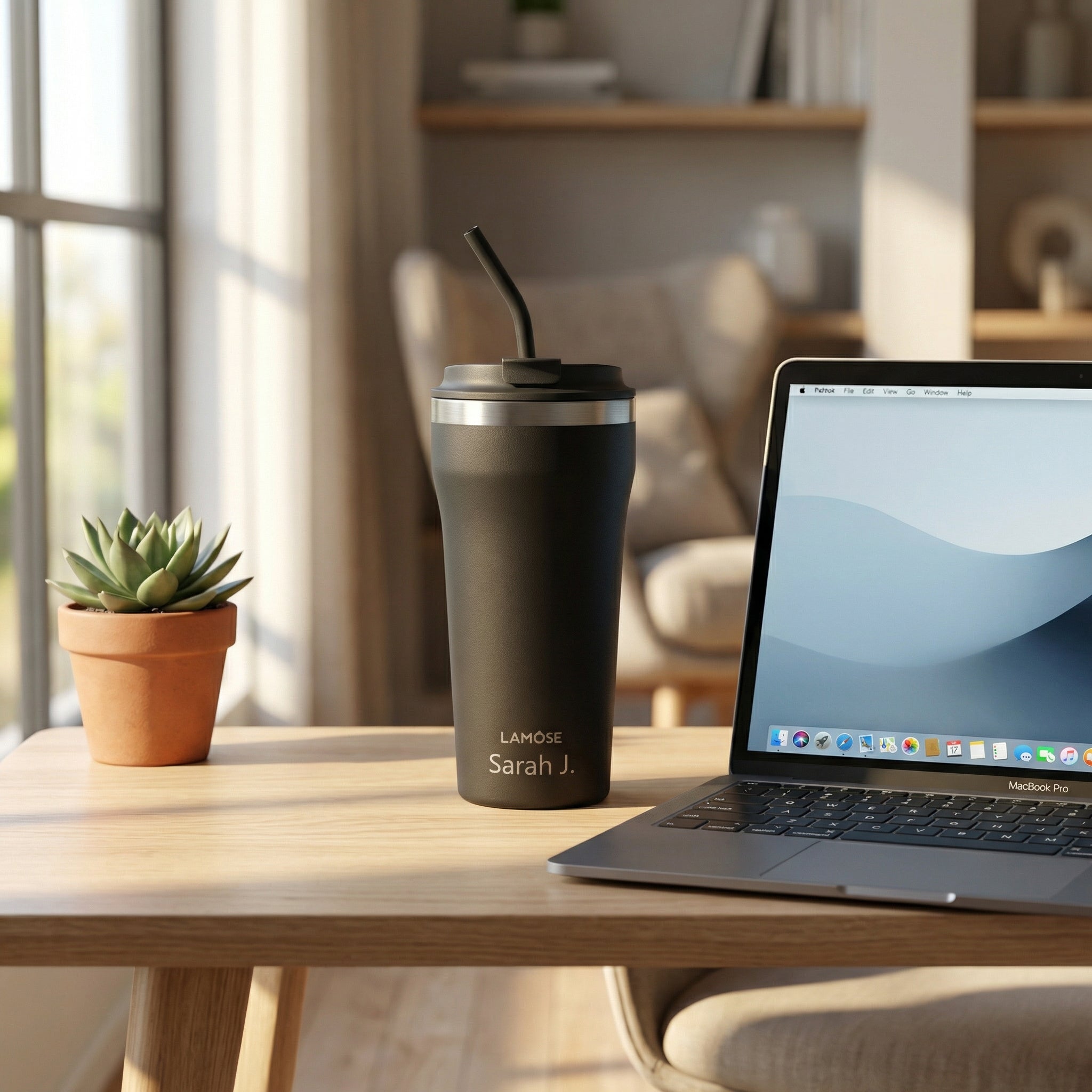 Custom engraved Bow Tumbler on desk next to laptop — perfect for the office
#color_onyx