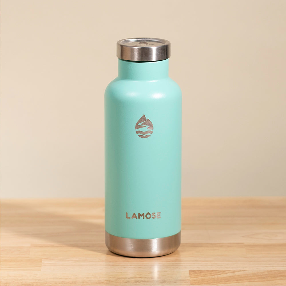 LAMOSE Moraine 20 oz turquoise insulated stainless steel bottle, front view, with a water drop design and steel cap.