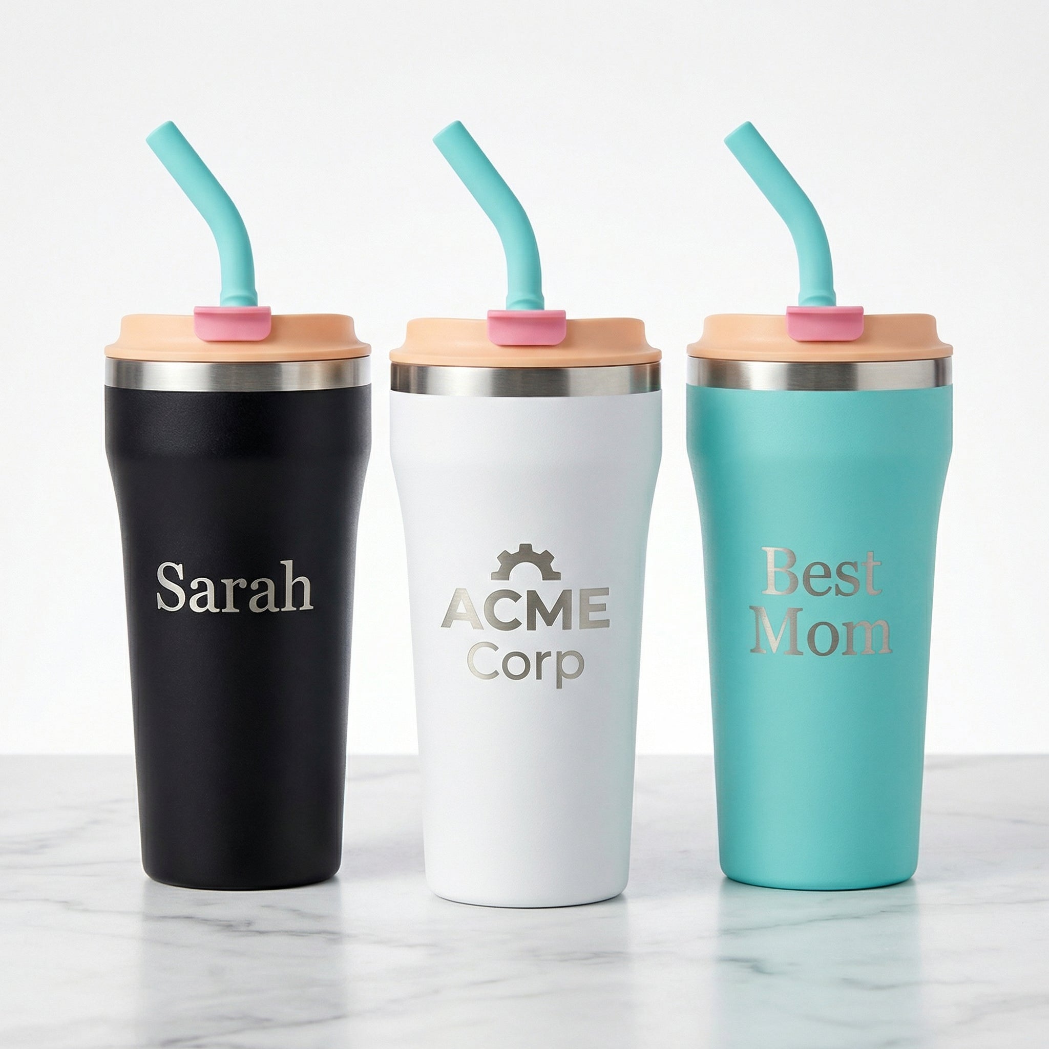 All three Bow Tumbler colors — Onyx, Snow, and Turquoise with custom laser engraving
