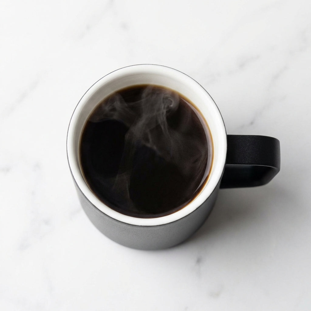 Top view of LAMOSE Hudson mug showing white ceramic interior lining with coffee