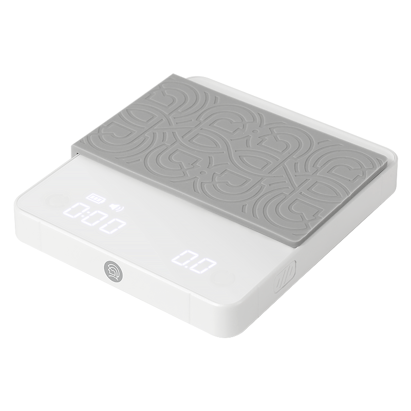 LAMOSE zeroHero mini white digital coffee scale, angled view, with gray patterned silicone mat and LED display showing timer and weight.